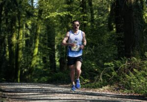 Aaron running forest